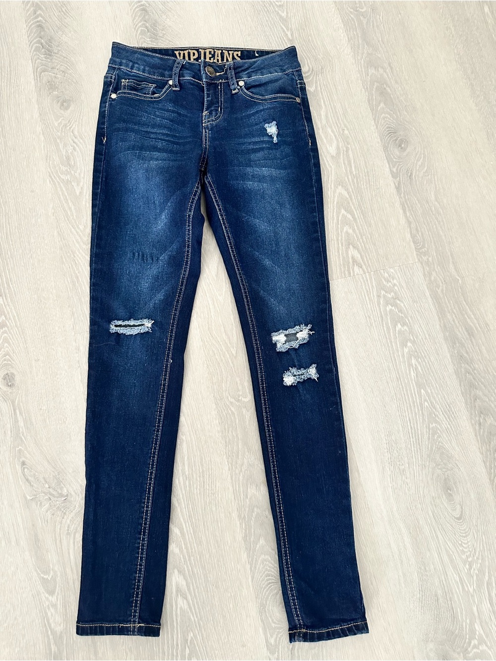 VIP Distressed Low Rise Skinny Jeans
